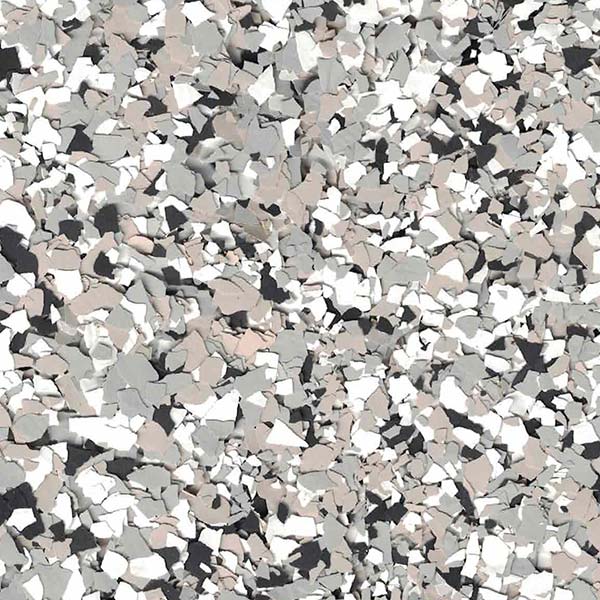 Close-up of a multi-colored, flake-style surface featuring a mix of gray, white, and black shades, creating a camouflaged, textured appearance.