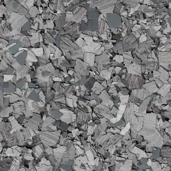 The image shows a detailed, close-up texture of tightly packed, irregularly shaped gray stone fragments with varied tones, creating a rough, mosaic-like pattern.