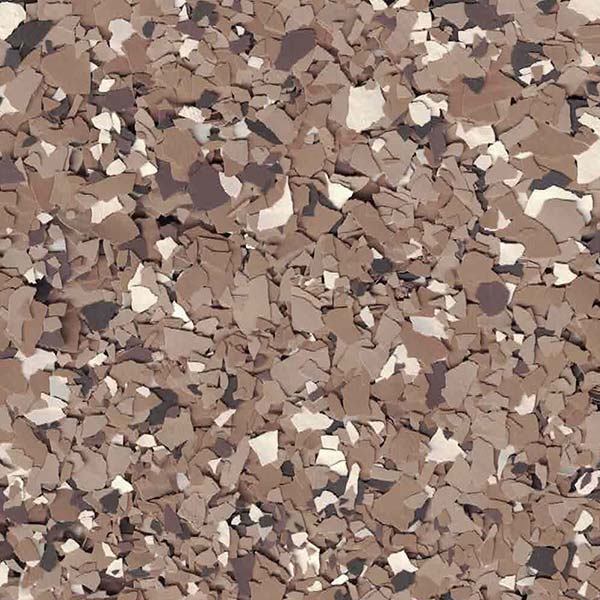 A close-up image of a surface with a mosaic pattern composed of various shades of beige, brown, and cream-colored chips.