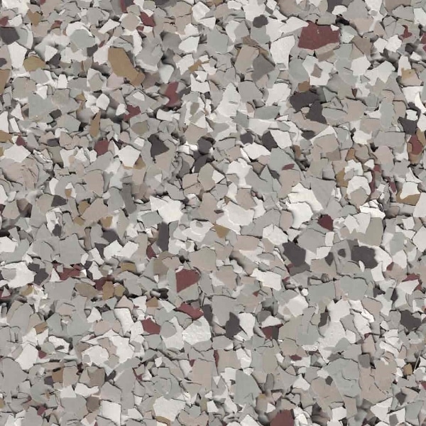 A close-up image of a textured surface with a speckled pattern in various shades of gray, beige, and brown. No recognizable landmarks visible.