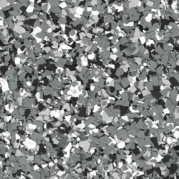 This image displays a surface covered with a terrazzo-style pattern of small, irregular chips in shades of gray, black, and white. No landmarks visible.